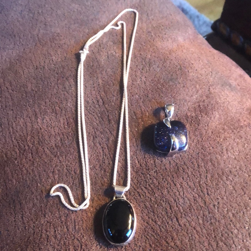 Silver chain and black pendants